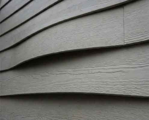 warped fiber cement siding